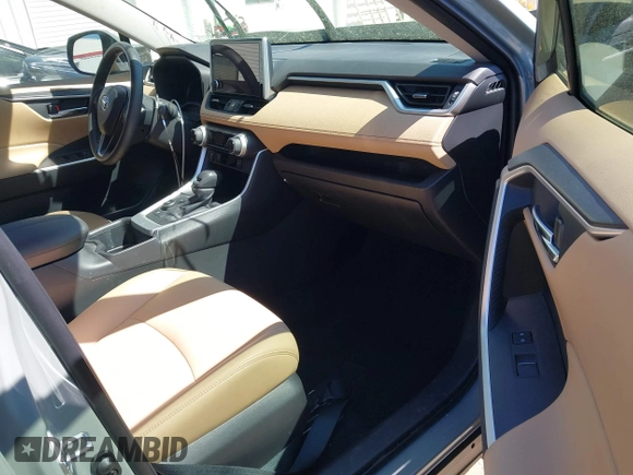 2023 Toyota RAV4 Hybrid XLE Premium z VIN JTMB6RFV8PD116502, wystawiony jako IAAI lot #41888174 z przebiegiem 19 253 mil mil oraz . Historia ofert i sprzedaży dostępna na DreamBid. Obrazek 5.