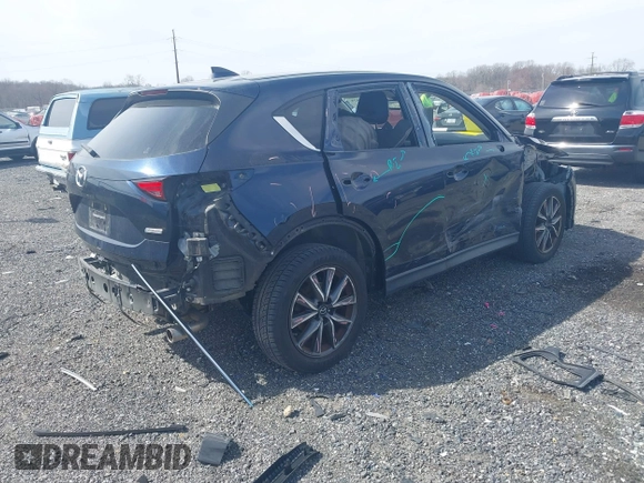 2018 Mazda CX-5 Grand Touring with VIN JM3KFBDM7J0343686, listed as a IAAI auction lot 41813638 with 74,084 mi miles. Bid and sale history available at carsss.com. Image 4.