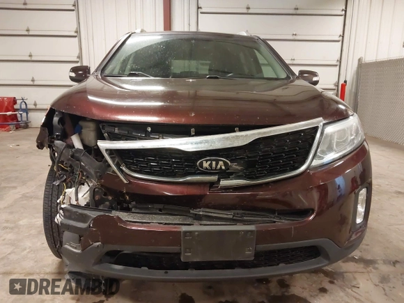 2014 Kia Sorento LX z VIN 5XYKTCA67EG541133, wystawiony jako IAAI lot #42335504 z przebiegiem 83 584 mil mil oraz . Historia ofert i sprzedaży dostępna na DreamBid. Obrazek 13.