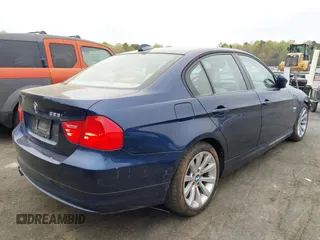 2011 BMW 3 Series 328i xDrive with VIN WBAPK5C50BA658103, listed as a IAAI auction lot 41948893 with 122,283 mi miles. Bid and sale history available at carsss.com. Image 4.