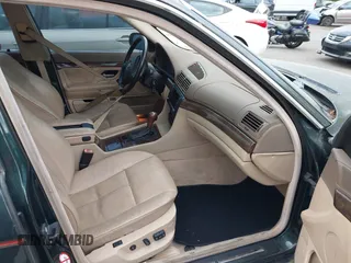 2001 BMW 7 Series 740iA with VIN WBAGG83451DN87732, listed as a IAAI auction lot 42083005 with 208,778 mi miles. Bid and sale history available at carsss.com. Image 5.