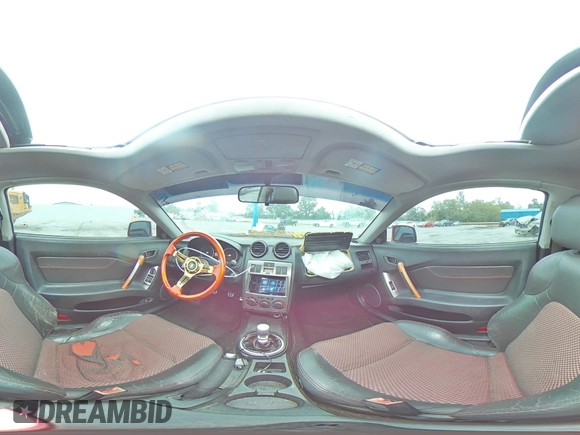 2006 Hyundai Tiburon GT z VIN KMHHN65F66U191134, wystawiony jako Copart lot #56692615 z przebiegiem 197 093 mil mil oraz Szkoda całkowita • Salvage title. Historia ofert i sprzedaży dostępna na DreamBid. Obrazek 15.