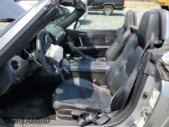 2010 Mazda MX-5 Miata Grand Touring with VIN JM1NC2FF5A0205190, listed as a Copart auction lot 61372455 with 147,852 mi miles and Salvage title. Bid and sale history available at DreamBid. Image 7.