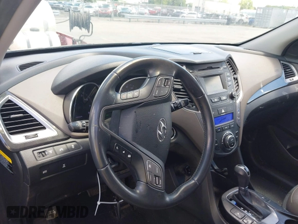 2013 Hyundai Santa Fe Sport z VIN 5XYZUDLA1DG050879, wystawiony jako IAAI lot #42236937 z przebiegiem 124 779 mil mil oraz . Historia ofert i sprzedaży dostępna na DreamBid. Obrazek 17.
