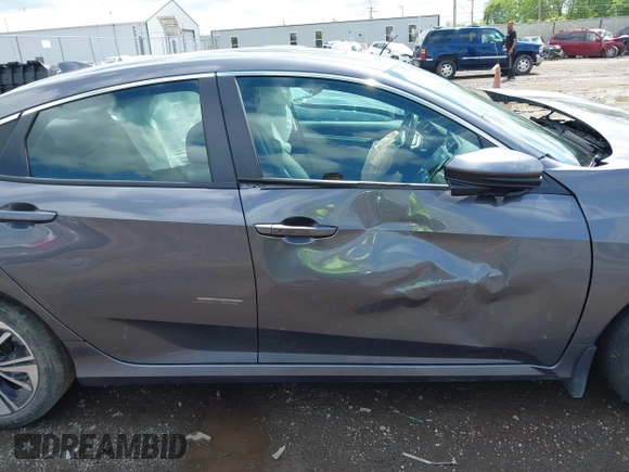 2018 Honda Civic EX-T z VIN 2HGFC1F34JH643975, wystawiony jako IAAI lot #42209799 z przebiegiem 58 684 mil mil oraz . Historia ofert i sprzedaży dostępna na DreamBid. Obrazek 13.