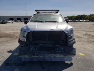 2016 Ford F-150 XL with VIN 1FTMF1C86GKD33700, listed as a Copart auction lot 48743235 with 104,561 mi miles and Salvage title. Bid and sale history available at DreamBid. Image 5.