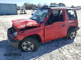 1998 Chevrolet Tracker z VIN 2CNBE1865W6905161, wystawiony jako Copart lot #45019735 z przebiegiem 142 991 mil mil oraz Szkoda całkowita • Salvage title. Historia ofert i sprzedaży dostępna na DreamBid. Obrazek 1.