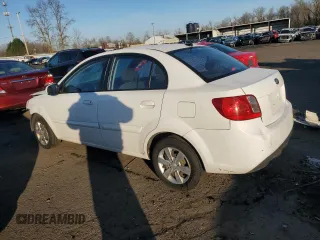 2010 Kia Rio LX with VIN KNADH4A35A6691869, listed as a Copart auction lot 42025785 with 126,381 mi miles and Salvage Title. Bid and sale history available at carsss.com. Image 2.