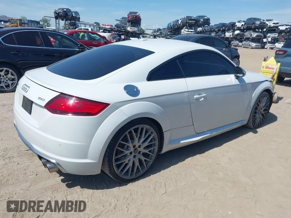 2016 Audi TTS 2.0T z VIN TRUC1AFV5G1030771, wystawiony jako IAAI lot #41940807 z przebiegiem 81 357 mil mil oraz . Historia ofert i sprzedaży dostępna na DreamBid. Obrazek 4.