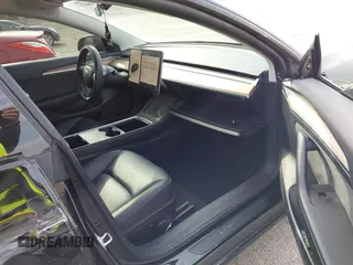 2022 Tesla Model 3 Long Range with VIN 5YJ3E1EB6NF343869, listed as a IAAI auction lot 41826077 with 36,643 mi miles and . Bid and sale history available at DreamBid. Image 5.