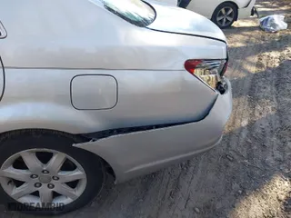 2006 Toyota Avalon XL with VIN 4T1BK36B46U147688, listed as a IAAI auction lot 41886568 with 210,581 mi miles. Bid and sale history available at carsss.com. Image 6.