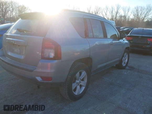 2016 Jeep Compass Sport with VIN 1C4NJCBA1GD743294, listed as a IAAI auction lot 41035177 with 124,379 mi miles. Bid and sale history available at carsss.com. Image 4.