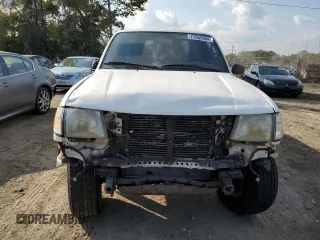 1999 Toyota Tacoma with VIN 4TAPM62N8XZ457624, listed as a Copart auction lot 71565904 with 133,851 mi miles and Salvage Title. Bid and sale history available at DreamBid. Image 5.