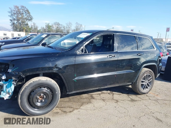2019 Jeep Grand Cherokee Altitude with VIN 1C4RJEAG7KC852263, listed as a IAAI auction lot 41590946 with 83,356 mi miles and . Bid and sale history available at DreamBid. Image 15.