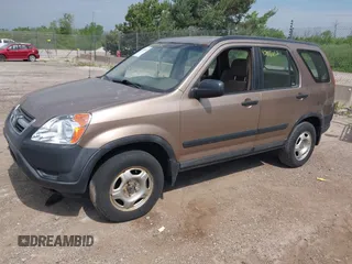 2003 Honda CR-V LX z VIN SHSRD78423U104208, wystawiony jako IAAI lot #42488652 z przebiegiem 214 049 mil mil oraz . Historia ofert i sprzedaży dostępna na DreamBid. Obrazek 2.