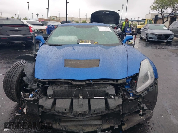 2016 Chevrolet Corvette Z51 3LT z VIN 1G1YM2D74G5116883, wystawiony jako IAAI lot #42160585 z przebiegiem 25 939 mil mil oraz . Historia ofert i sprzedaży dostępna na DreamBid. Obrazek 13.