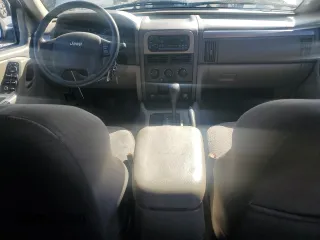 2004 Jeep Grand Cherokee with VIN 1J8GX48S84C329291, listed as a Copart auction lot 43295185 with 234,680 mi miles and Salvage title. Bid and sale history available at DreamBid. Image 8.