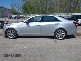 2014 Cadillac CTS Performance AWD z VIN 1G6AY5S38E0185345, wystawiony jako IAAI lot #42216924 z przebiegiem 141 654 mil mil oraz . Historia ofert i sprzedaży dostępna na DreamBid. Obrazek 14.