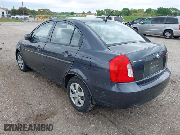 2010 Hyundai Accent GLS with VIN KMHCN4AC5AU464938, listed as a IAAI auction lot 42161461 with 134,296 mi miles. Bid and sale history available at carsss.com. Image 3.