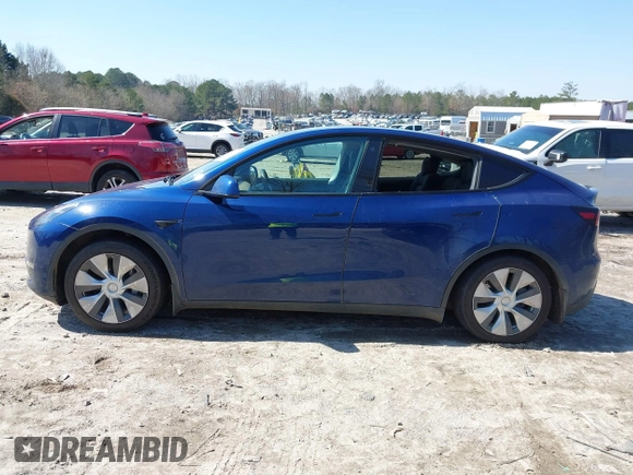 2021 Tesla Model Y Long Range with VIN 5YJYGAEE1MF207948, listed as a IAAI auction lot 41779570 with 100,859 mi miles. Bid and sale history available at carsss.com. Image 14.