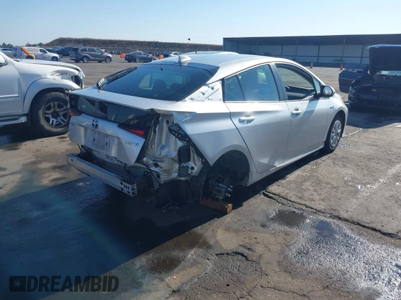 2021 Toyota Prius L Eco with VIN JTDKAMFU7M3142616, listed as a IAAI auction lot 42755833 with 40,542 mi miles and . Bid and sale history available at DreamBid. Image 4.