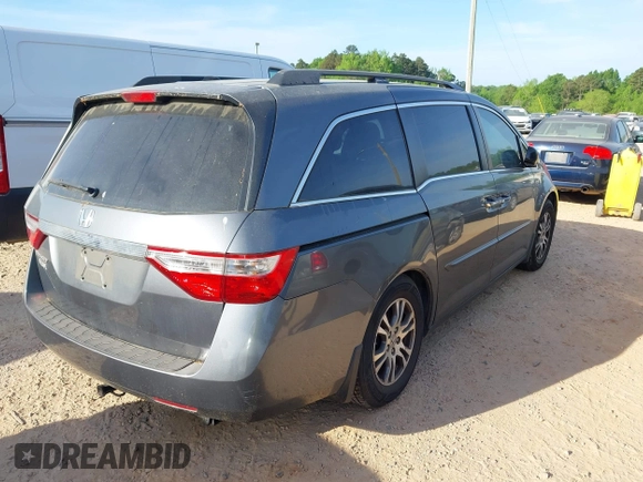 2012 Honda Odyssey EX-L with VIN 5FNRL5H63CB006272, listed as a IAAI auction lot 42074163 with 187,785 mi miles and . Bid and sale history available at carsss.com. Image 4.