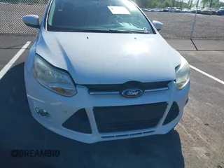 2014 Ford Focus SE with VIN 1FADP3K24EL314209, listed as a IAAI auction lot 42026038 with 167,297 mi miles. Bid and sale history available at carsss.com. Image 6.