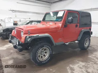2006 Jeep Wrangler Sport with VIN 1J4FA49S06P729497, listed as a IAAI auction lot 41906227 with 134,573 mi miles. Bid and sale history available at carsss.com. Image 2.