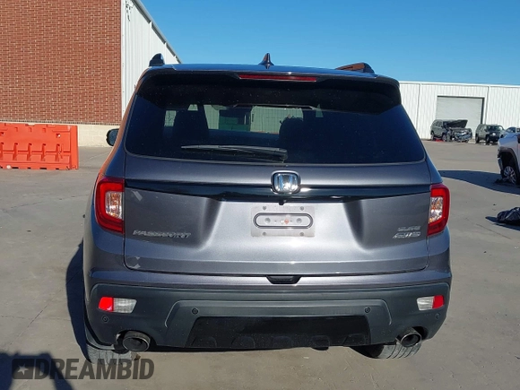 2019 Honda Passport Elite z VIN 5FNYF8H07KB015720, wystawiony jako IAAI lot #41221298 z przebiegiem 65 747 mil mil oraz . Historia ofert i sprzedaży dostępna na DreamBid. Obrazek 17.