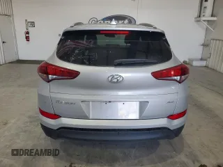 2018 Hyundai Tucson SEL with VIN KM8J3CA49JU608135, listed as a Copart auction lot 52736635 with 100,992 mi miles and Clean title. Bid and sale history available at DreamBid. Image 6.