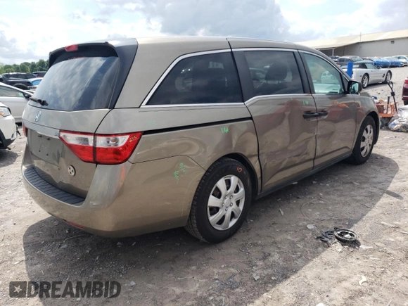 2012 Honda Odyssey LX с VIN 5FNRL5H29CB081071, выставлен на аукционе Copart как лот 56751545 с пробегом 233 240 миль миль и Списание • Salvage title. История ставок и продаж доступна на DreamBid. Изображение 3.