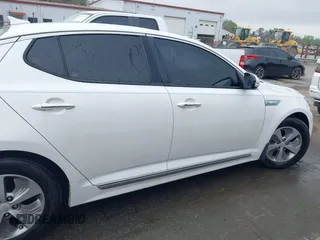 2016 Kia Optima Hybrid with VIN KNAGM4AD9G5092084, listed as a IAAI auction lot 41879089 with 141,927 mi miles. Bid and sale history available at carsss.com. Image 13.