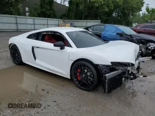 2018 Audi R8 V10 z VIN WUABAAFX5J7902445, wystawiony jako Copart lot #56587934 z przebiegiem Nie podano mil oraz Szkody całkowita. Historia ofert i sprzedaży dostępna na DreamBid. Obrazek 4.