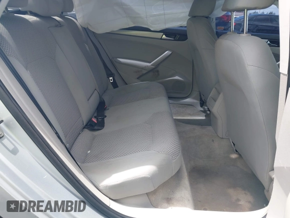 2014 Volkswagen Passat S with VIN 1VWAS7A38EC028292, listed as a IAAI auction lot 42357817 with 151,695 mi miles and . Bid and sale history available at DreamBid. Image 8.