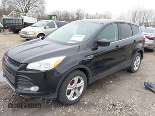 2013 Ford Escape SE with VIN 1FMCU9G94DUA21681, listed as a IAAI auction lot 42057896 with 197,257 mi miles. Bid and sale history available at carsss.com. Image 2.