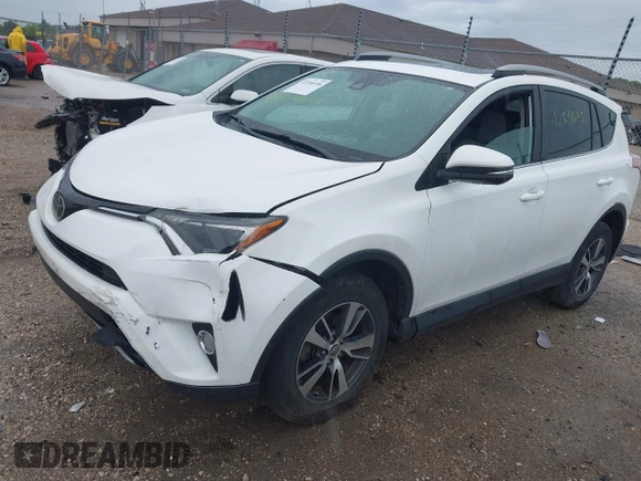 2018 Toyota RAV4 XLE with VIN 2T3WFREV4JW469929, listed as a IAAI auction lot 42536958 with 82,443 mi miles and . Bid and sale history available at DreamBid. Image 2.