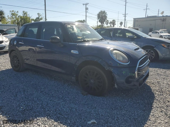2016 MINI Cooper Hardtop 4 Door S with VIN WMWXU3C55G2D29125, listed as a Copart auction lot 50220615 with 58,681 mi miles and Salvage Title. Bid and sale history available at carsss.com. Image 4.