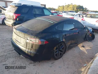 2021 Tesla Model S Plaid with VIN 5YJSA1E62MF451785, listed as a IAAI auction lot 40520806 with 31,084 mi miles. Bid and sale history available at carsss.com. Image 4.