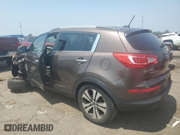 2011 Kia Sportage EX z VIN KNDPCCA27B7101294, wystawiony jako Copart lot #64284315 z przebiegiem 82 592 mil mil oraz Czysty tytuł • Clean title. Historia ofert i sprzedaży dostępna na DreamBid. Obrazek 2.