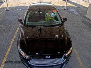 2016 Ford Fusion SE with VIN 3FA6P0H75GR318851, listed as a IAAI auction lot 42853126 with 59,063 mi miles and . Bid and sale history available at DreamBid. Image 6.