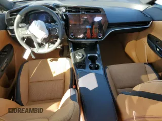 2024 Lexus RZ 450e Premium with VIN JTJAAAAB9RA026687, listed as a Copart auction lot 49332935 with 2,085 mi miles and Salvage title. Bid and sale history available at DreamBid. Image 8.