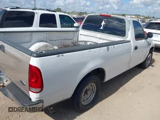 1998 Ford F-150 with VIN 1FTZF1729WKB83429, listed as a IAAI auction lot 42549303 with 173,426 mi miles and . Bid and sale history available at DreamBid. Image 4.