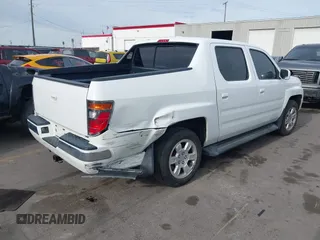 2006 Honda Ridgeline RTL z VIN 2HJYK16586H519593, wystawiony jako IAAI lot #42111678 z przebiegiem 244 962 mil mil oraz . Historia ofert i sprzedaży dostępna na DreamBid. Obrazek 4.
