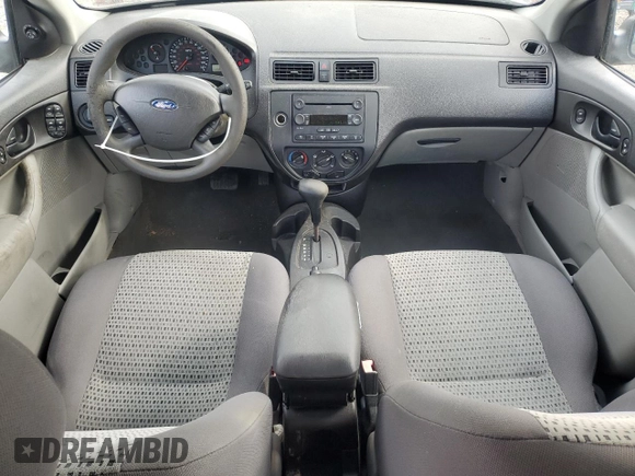 2007 Ford Focus S z VIN 1FAFP34N67W111209, wystawiony jako Copart lot #52708405 z przebiegiem 100 538 mil mil oraz Czysty tytuł • Clean title. Historia ofert i sprzedaży dostępna na DreamBid. Obrazek 8.