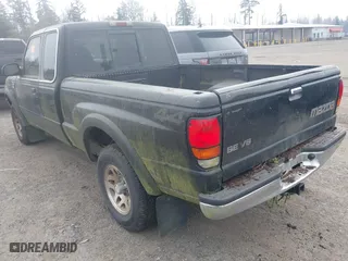1999 Mazda B-Series 4WD Truck SE with VIN 4F4ZR17X5XTM17667, listed as a IAAI auction lot 41896804 with 101,596 mi miles. Bid and sale history available at carsss.com. Image 3.