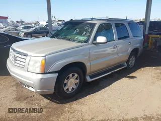 2005 Cadillac Escalade z VIN 1GYEC63T65R164307, wystawiony jako IAAI lot #42015617 z przebiegiem 173 270 mil mil oraz . Historia ofert i sprzedaży dostępna na DreamBid. Obrazek 2.