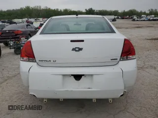 2014 Chevrolet Impala LT with VIN 2G1WB5E30E1142857, listed as a Copart auction lot 52650575 with 230,412 mi miles and Salvage Title. Bid and sale history available at DreamBid. Image 6.