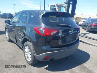 2013 Mazda CX-5 Touring with VIN JM3KE2CEXD0153589, listed as a IAAI auction lot 41855356 with 86,030 mi miles and . Bid and sale history available at DreamBid. Image 14.