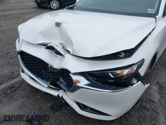 2021 Mazda 3 Preferred z VIN 3MZBPBCL0MM250862, wystawiony jako IAAI lot #42318612 z przebiegiem 86 056 mil mil oraz . Historia ofert i sprzedaży dostępna na DreamBid. Obrazek 6.