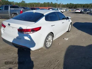 2016 Kia Optima LX with VIN 5XXGT4L36GG005859, listed as a IAAI auction lot 41053277 with 127,783 mi miles. Bid and sale history available at carsss.com. Image 4.